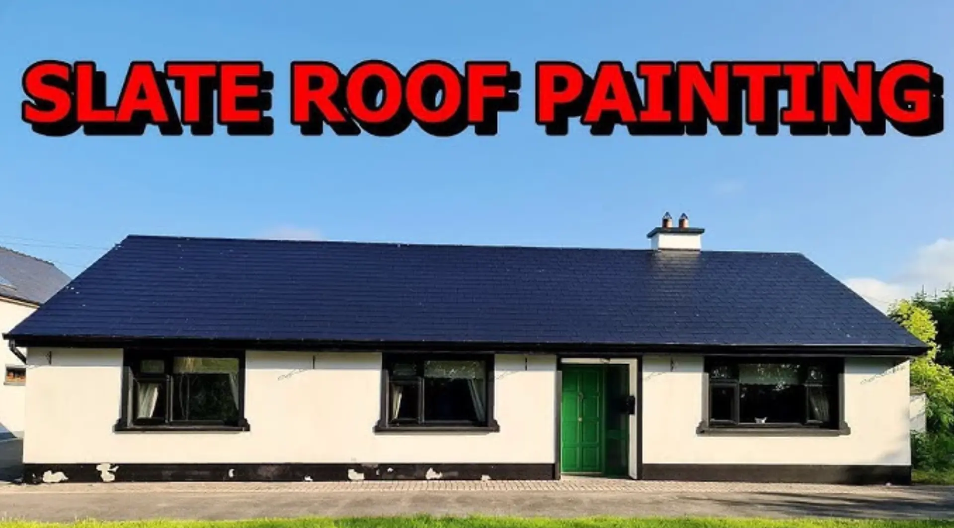Bungalow with a freshly painted dark slate roof after protective coating